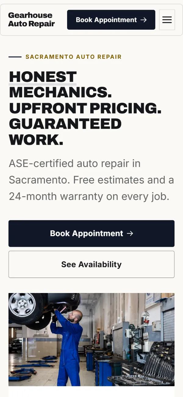 Bold auto repair website template on a phone: a dark first screen, big capital headlines and one loud accent colour