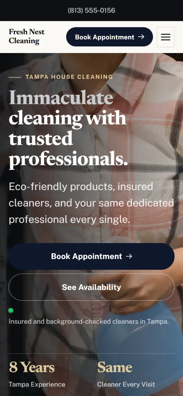 Luxury cleaning company website template on a phone: dark and understated, with a serif headline over a full-width photo