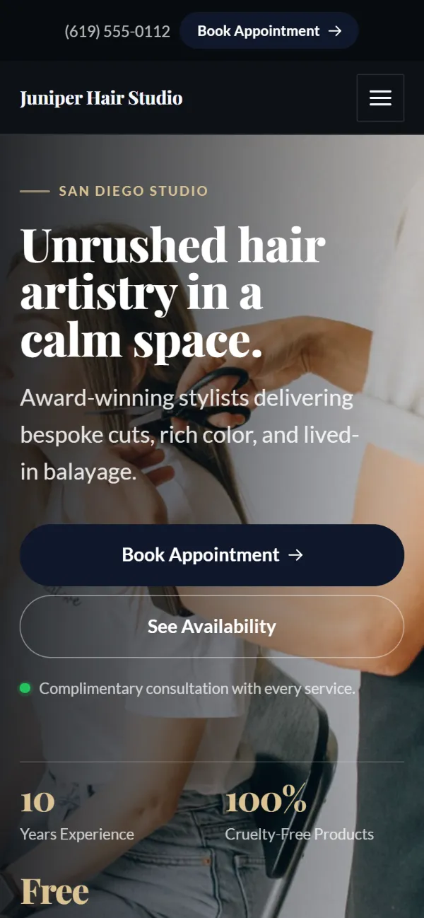 Luxury hair salon website template on a phone: dark and understated, with a serif headline over a full-width photo