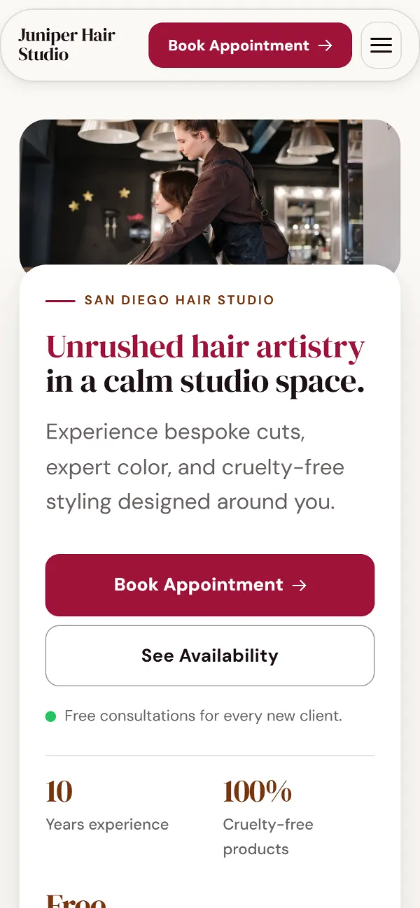 Warm hair salon website template on a phone: soft cards and warm colours under a wide photo