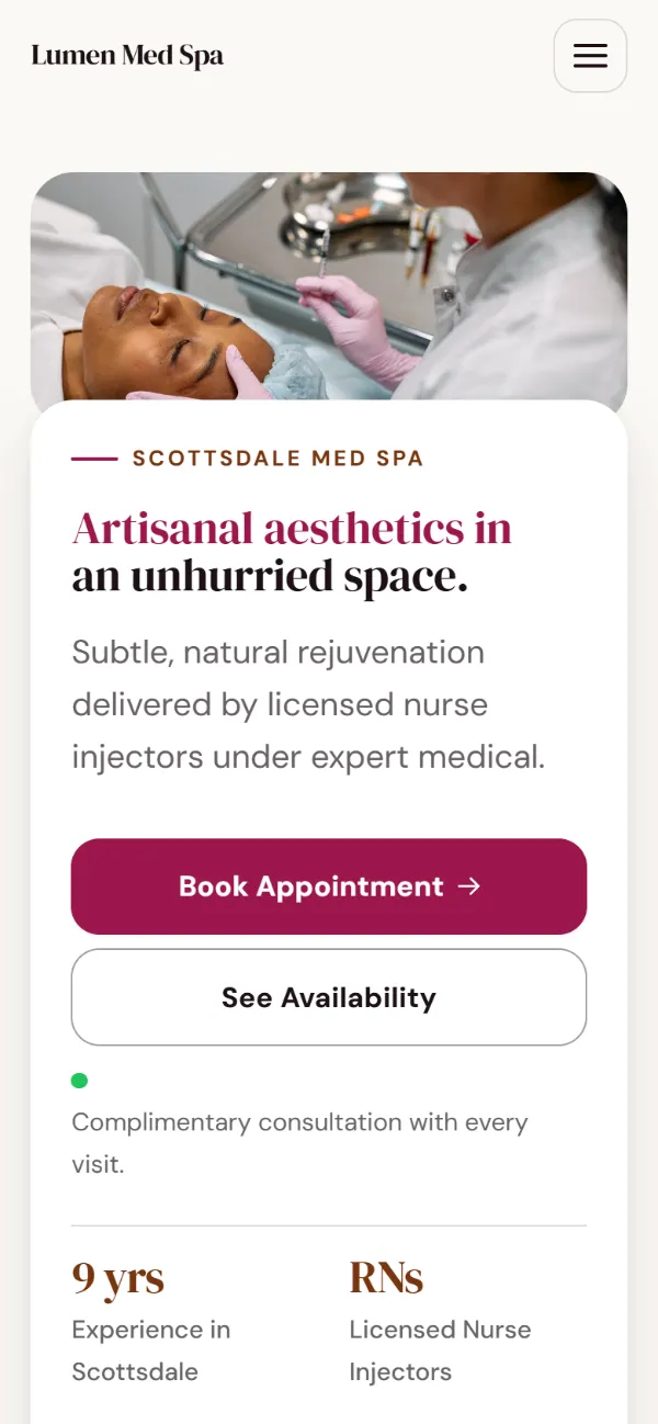 Warm med spa website template on a phone: soft cards and warm colours under a wide photo