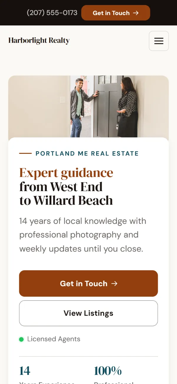Warm real estate website template on a phone: soft cards and warm colours under a wide photo