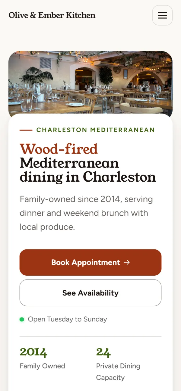 Warm restaurant website template on a phone: soft cards and warm colours under a wide photo